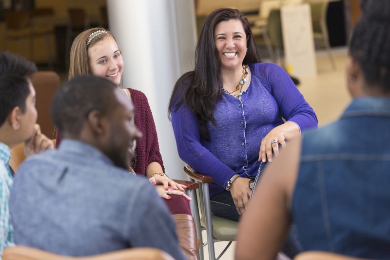 Teens in group therapy with parents.